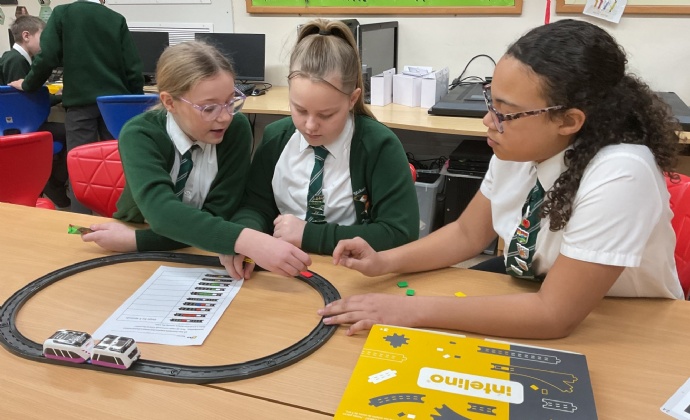 Year 6 children investigating Intelino trains