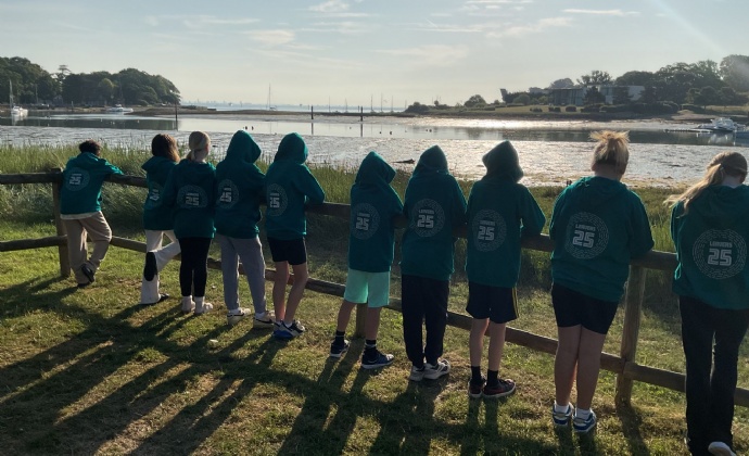 Children looking out to the sea